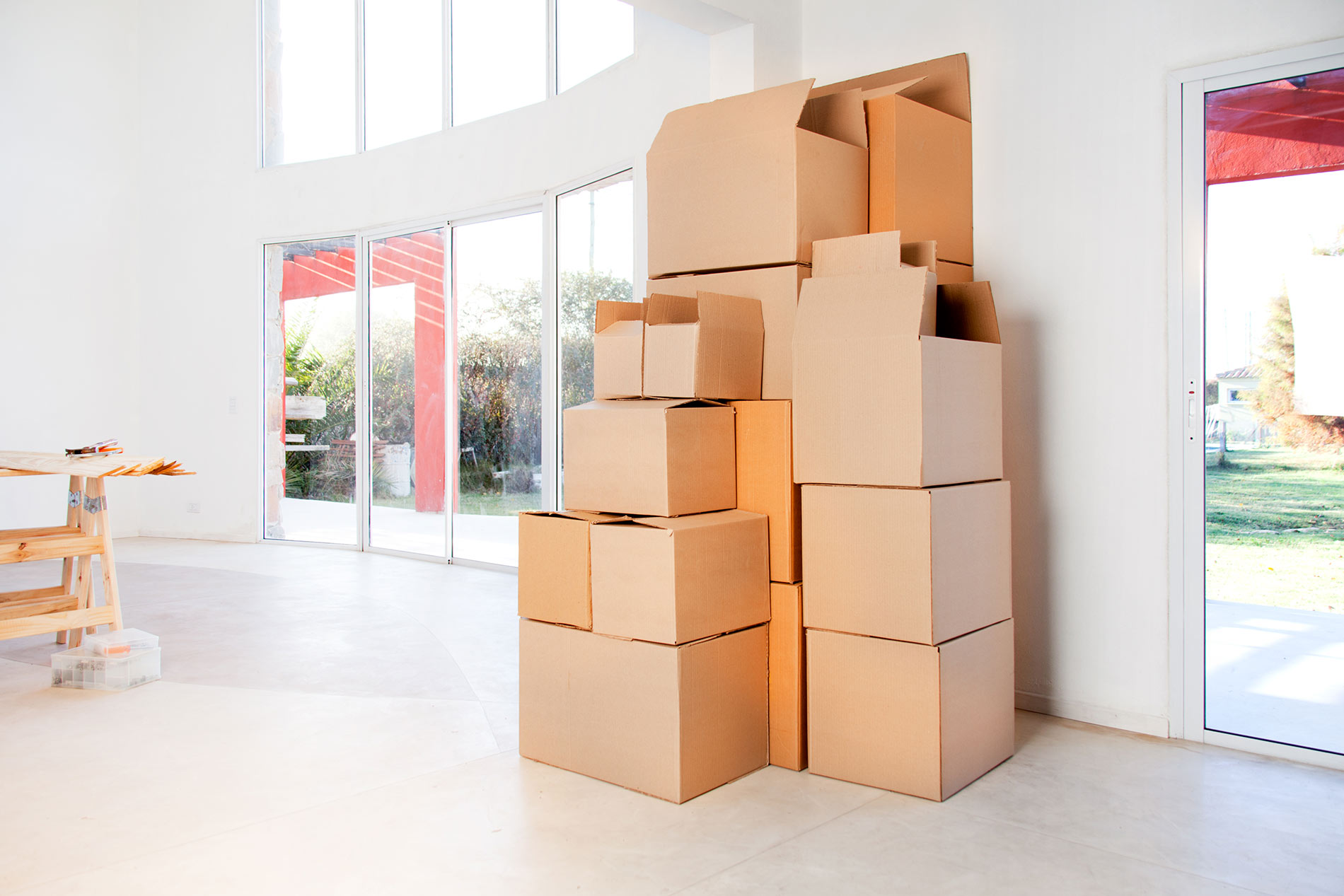 A room with many boxes stacked on top of each other.
